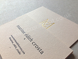 Gold foil business cards - Vellum colorplan business cards with gloss black text and gold foil logo.